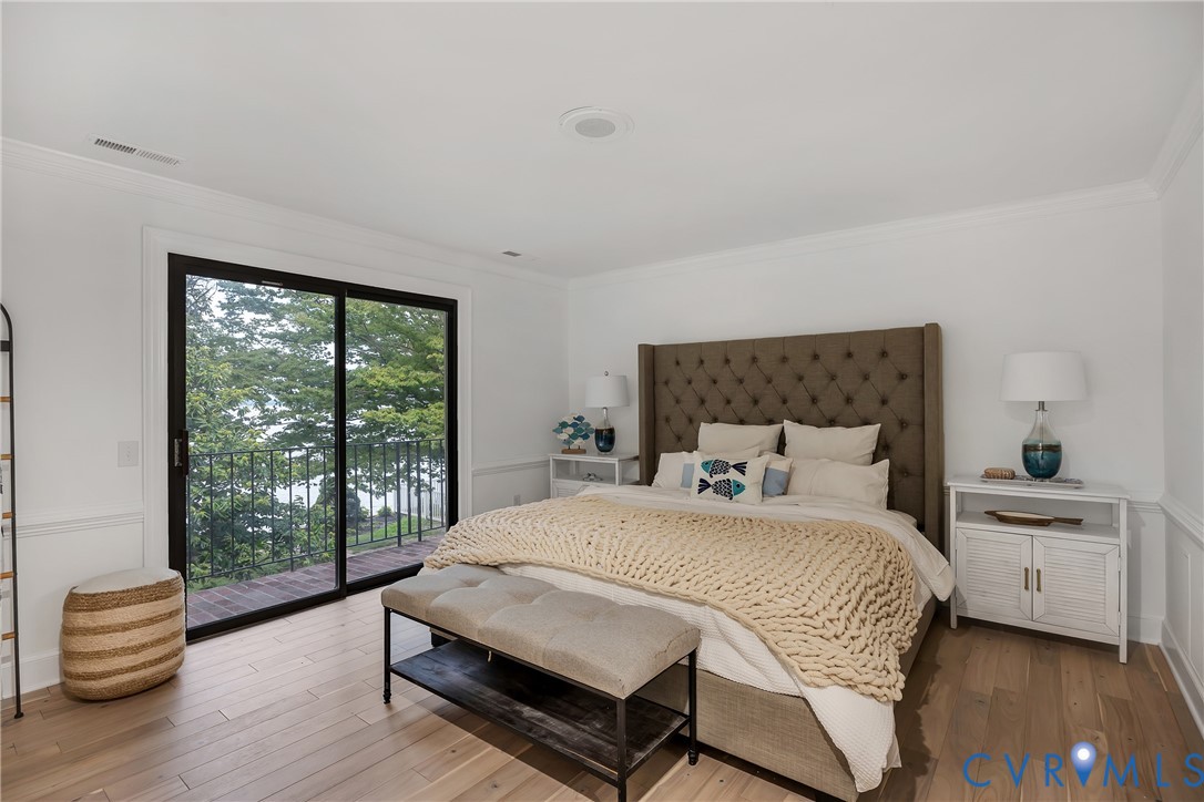 467 Daingerfield Road Tappahannock, VA 22560 - Photo 33 of 50 a bedroom with a bed and window