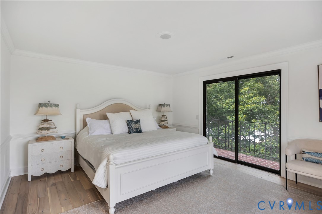 467 Daingerfield Road Tappahannock, VA 22560 - Photo 35 of 50 a bedroom with a bed and large window