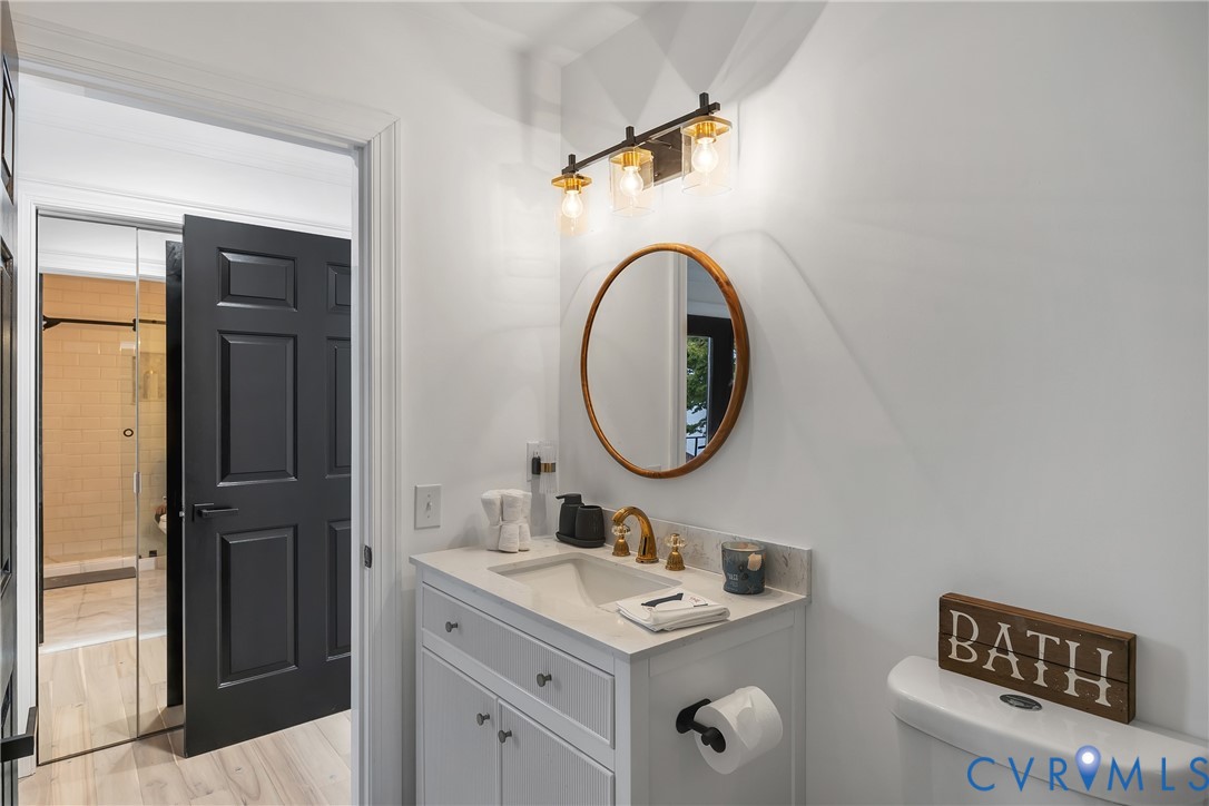 467 Daingerfield Road Tappahannock, VA 22560 - Photo 36 of 50 a bathroom with a sink and a mirror