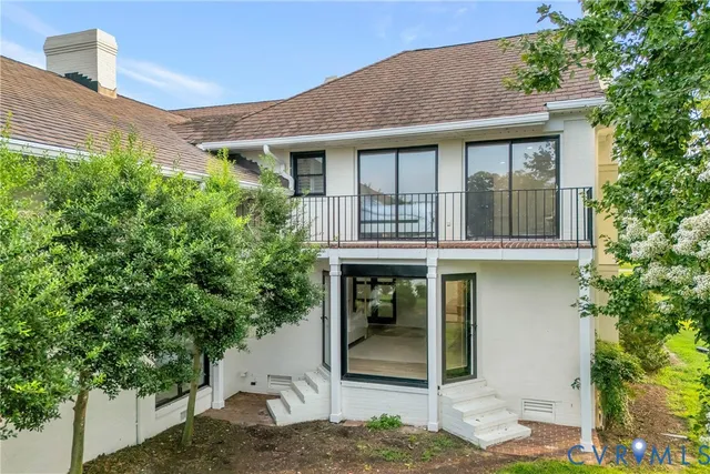 a house with trees in front of it