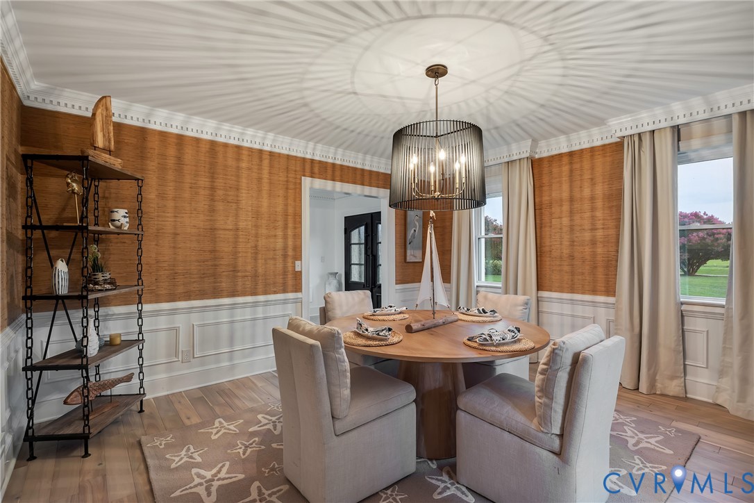 467 Daingerfield Road Tappahannock, VA 22560 - Photo 6 of 50 a view of a dining room with furniture wooden floor and chandelier