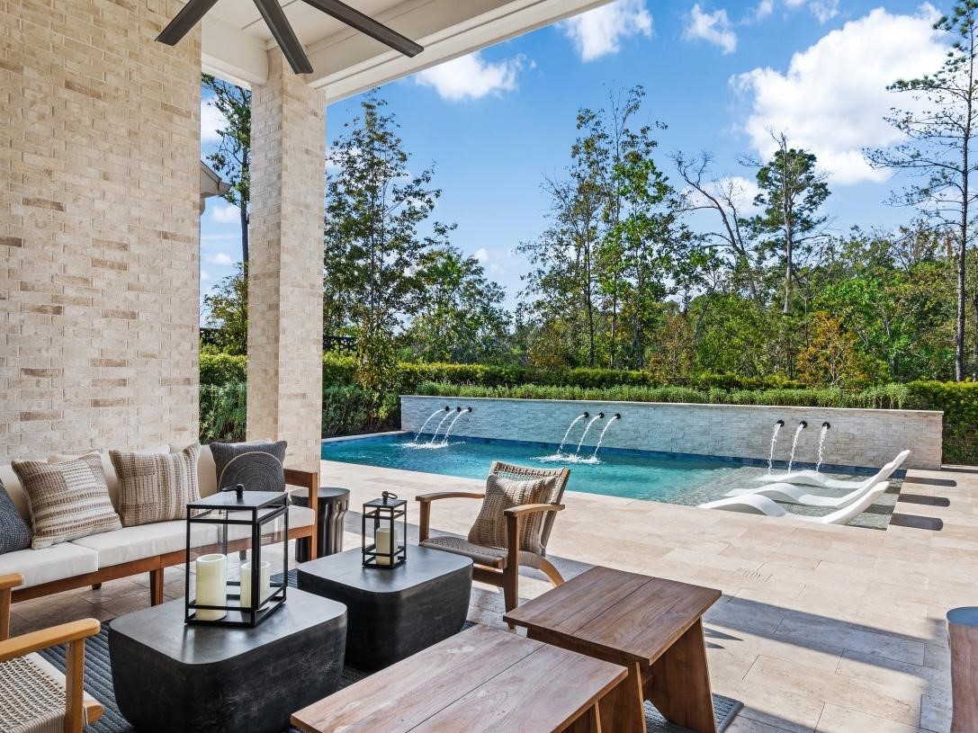 4807 Morning Spgs Drive Spring, TX 77386 - Photo 12 of 14 a terrace with outdoor seating and trees