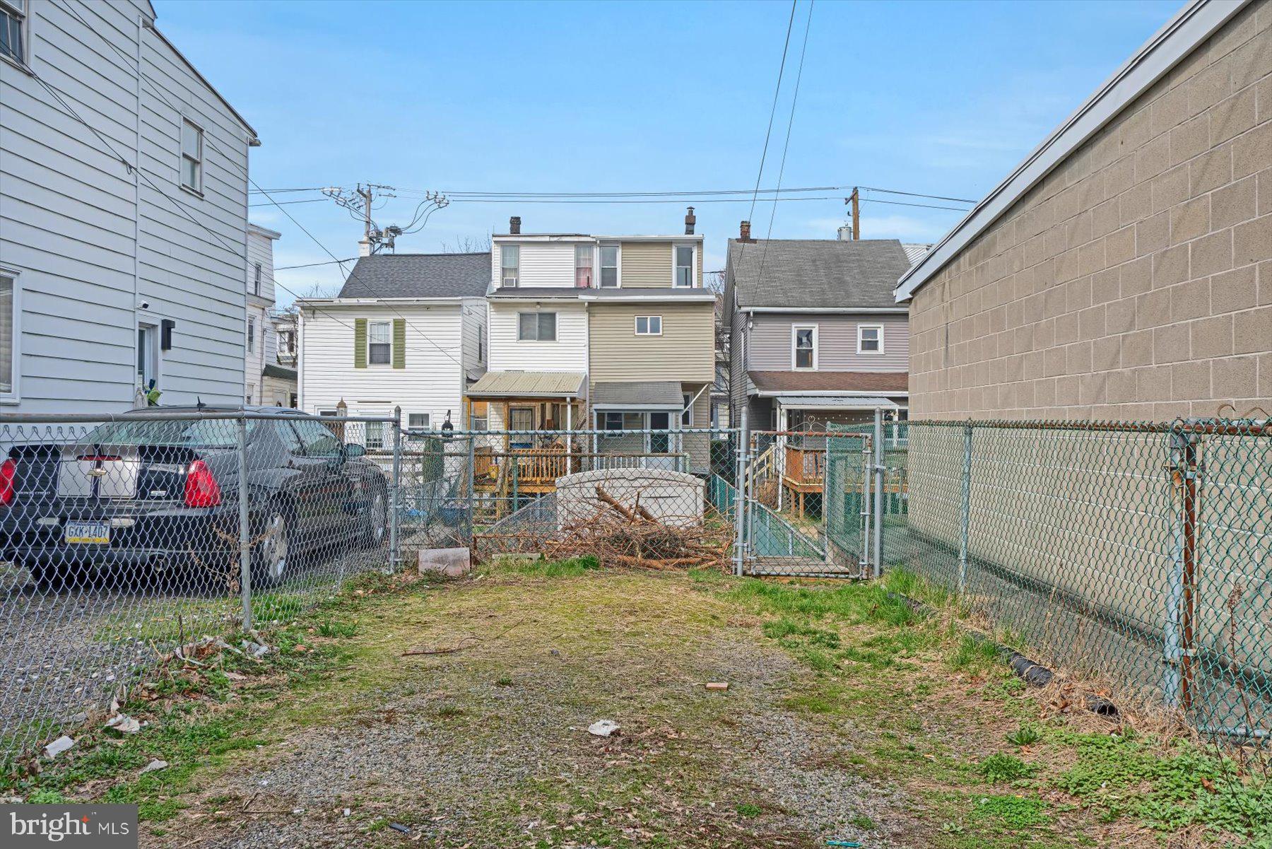 23 North 6th Street Shamokin, PA 17872 - Photo 27 of 27 a view of a house with a backyard and a patio