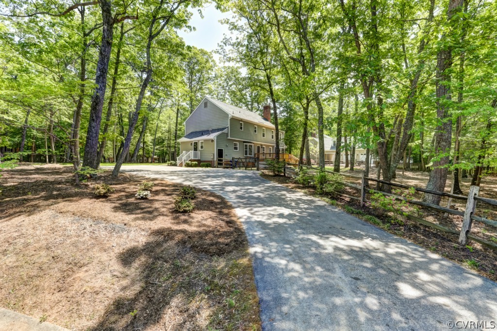 2020 Winterfield Road Midlothian, VA 23113 - Photo 19 of 20 a front view of a house with a yard