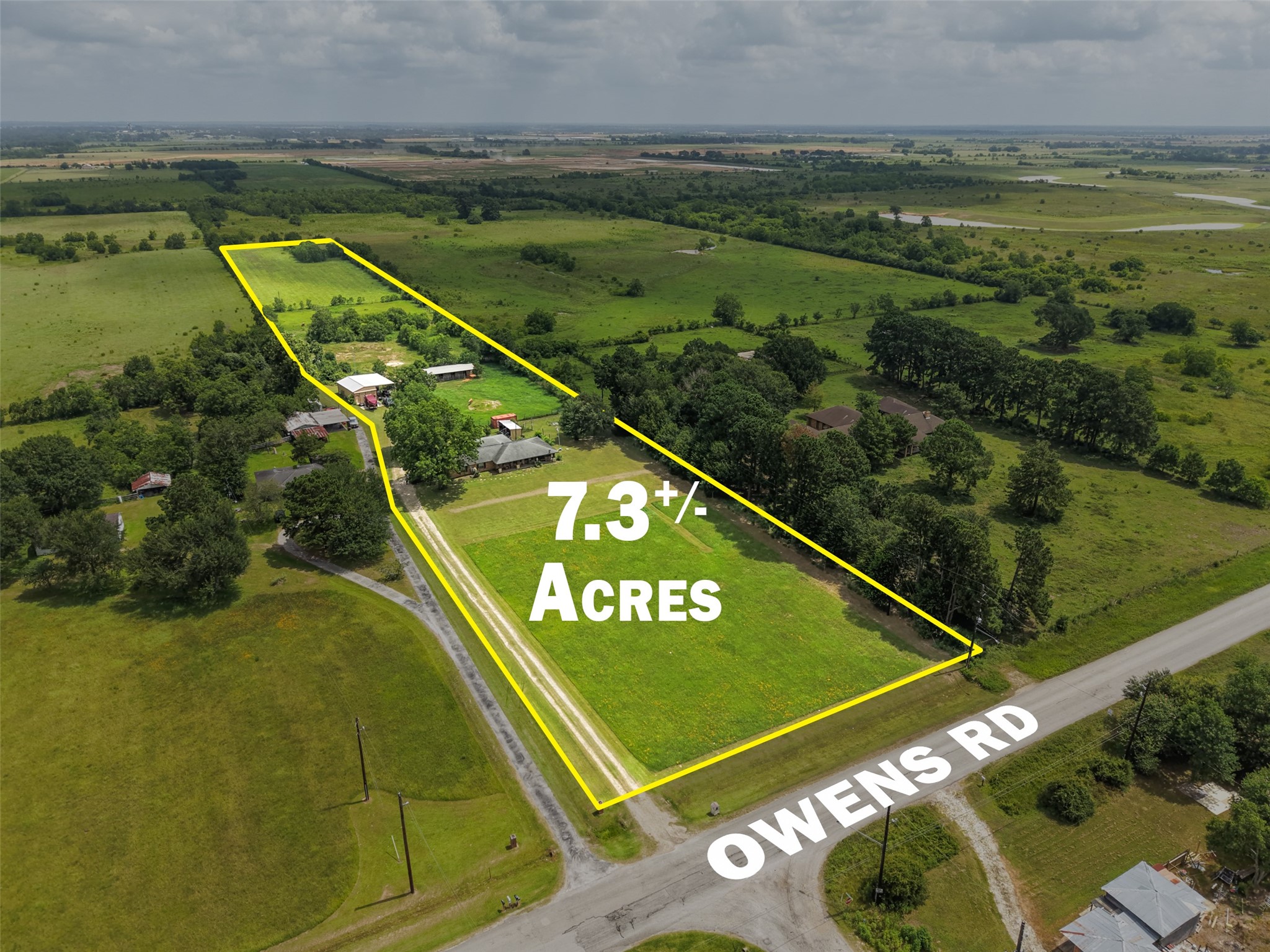 34366 Owens Road Hempstead, TX 77445 - Photo 1 of 46 Aerial view of the 7.3-acre tract, illustrating the open pasture, rural setting, and excellent potential for a homesite, ranch, or recreational use