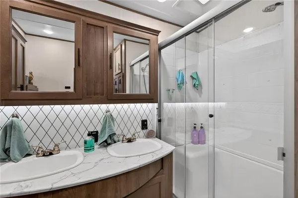 a bathroom with a sink and a mirror