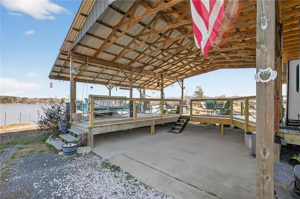 a view of a lounge chairs in the deck
