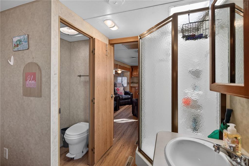 617 County Road 432 Centre, AL 35960 - Photo 41 of 48 a bathroom with a sink toilet and shower