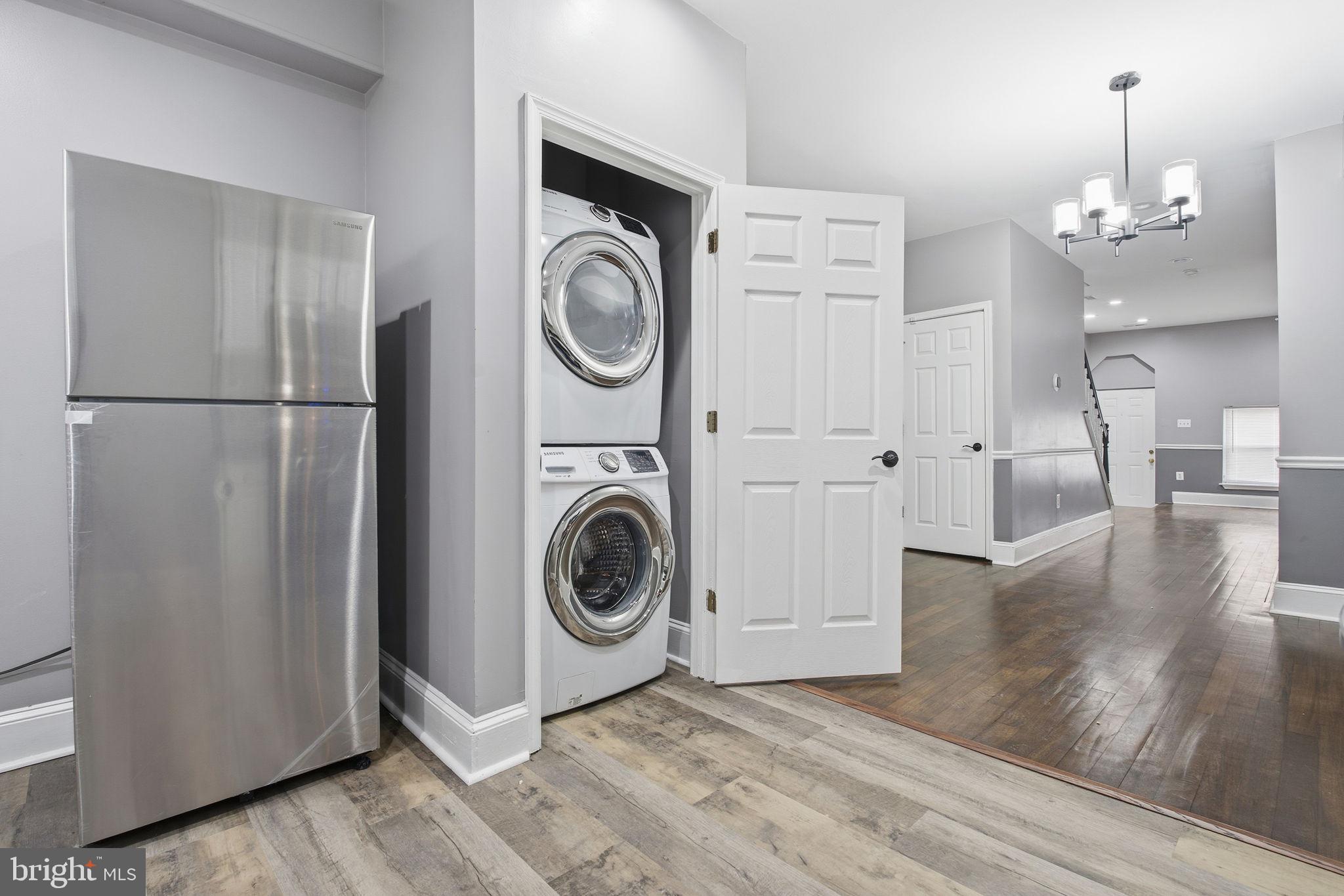 1806 East Lafayette Avenue Baltimore, MD 21213 - Photo 12 of 33 a view of a hallway with washer and dryer