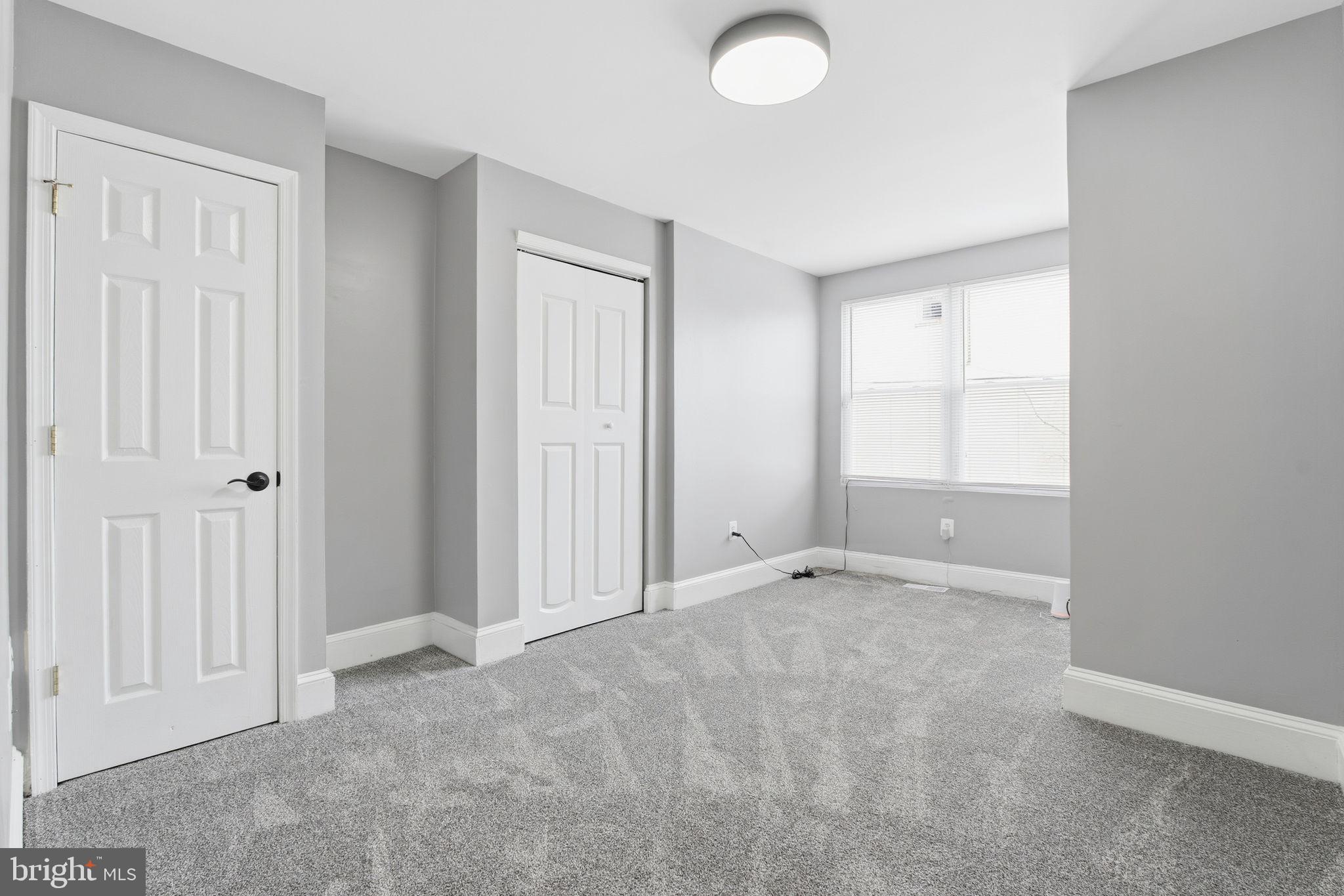 1806 East Lafayette Avenue Baltimore, MD 21213 - Photo 15 of 33 an empty room with windows