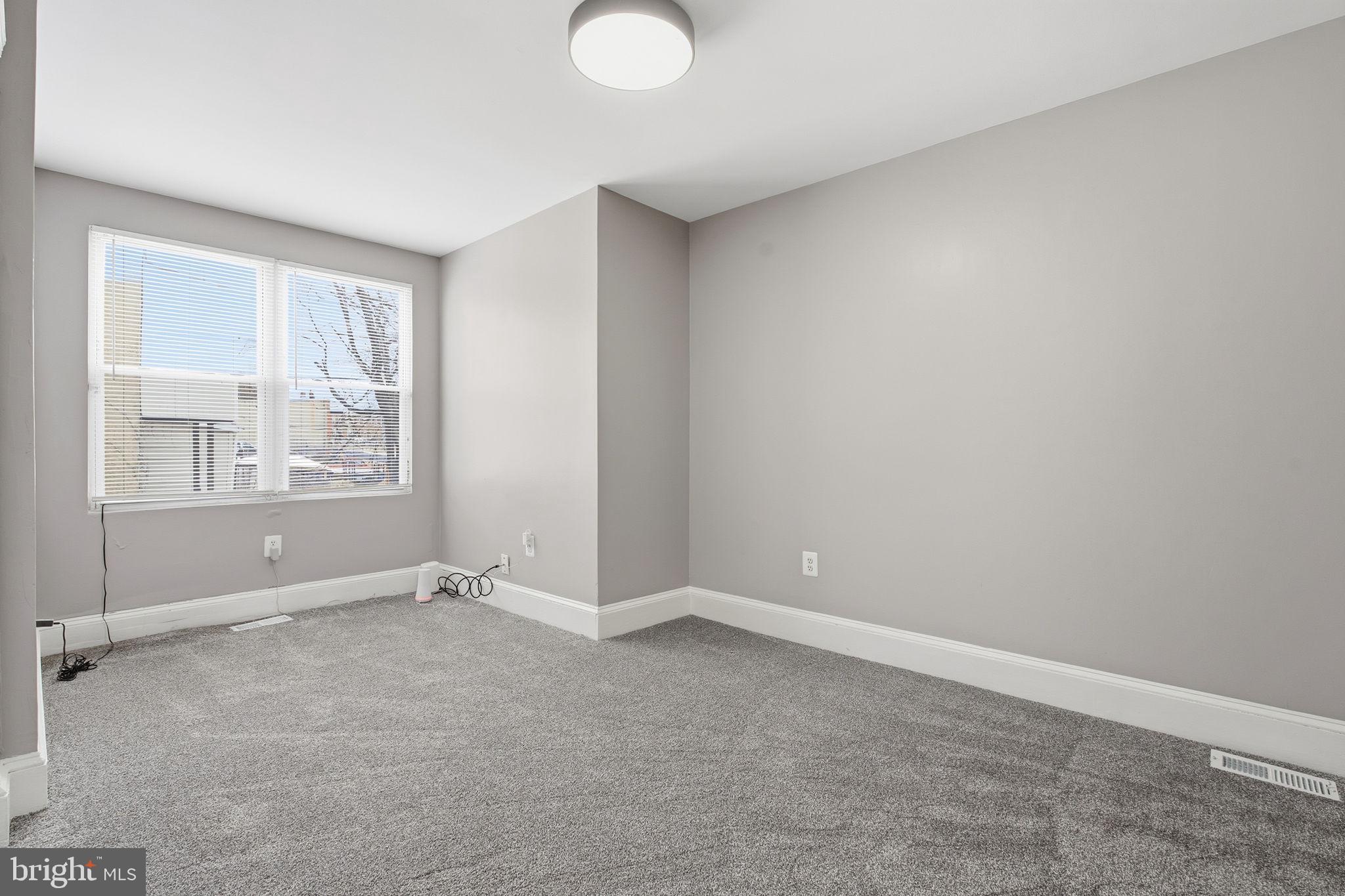 1806 East Lafayette Avenue Baltimore, MD 21213 - Photo 16 of 33 an empty room with windows