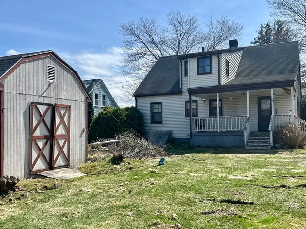 a view of backyard of house
