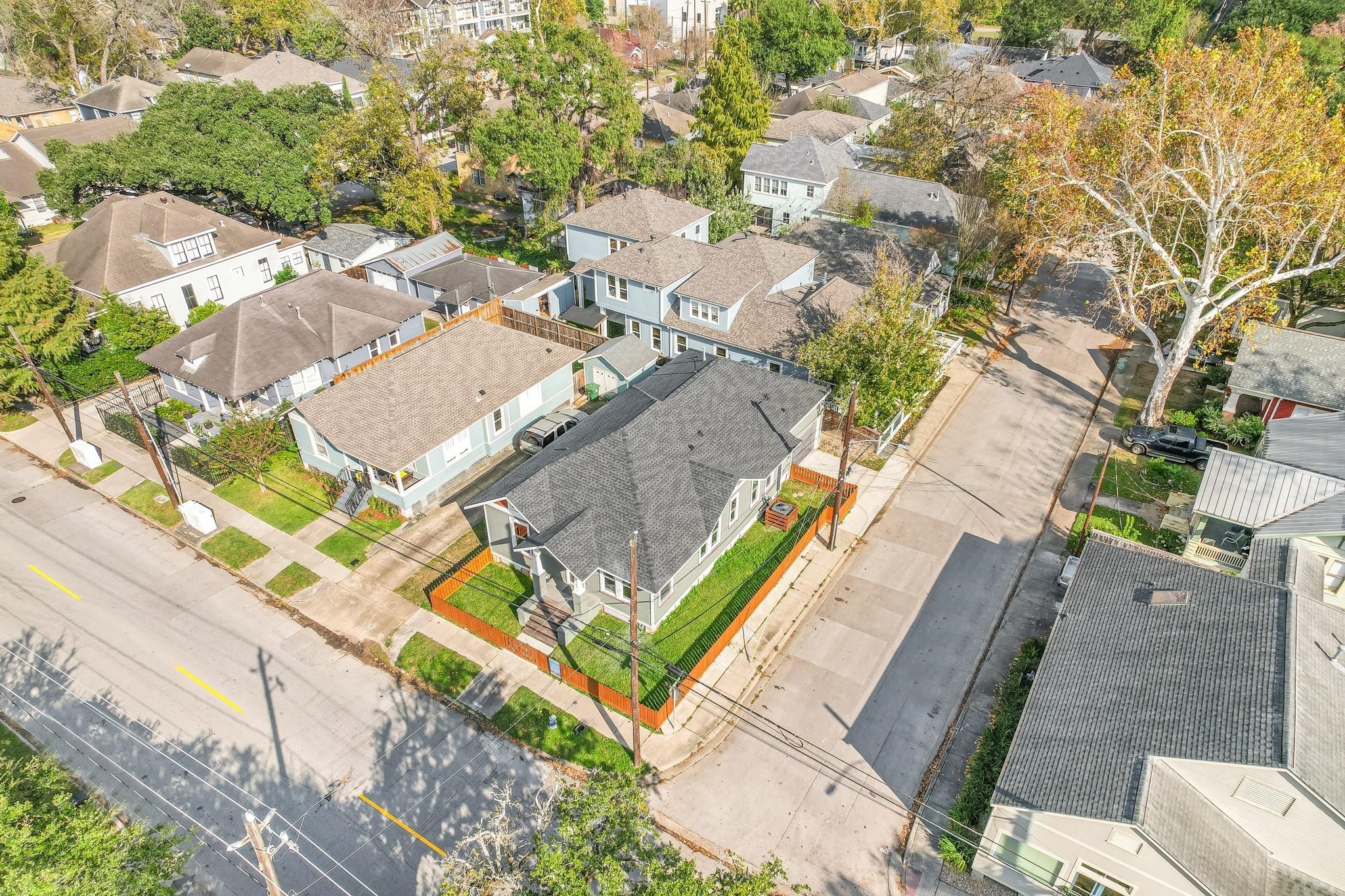 2902 Houston Avenue Houston, TX 77009 - Photo 1 of 42 an aerial view of a house with a big yard and large trees