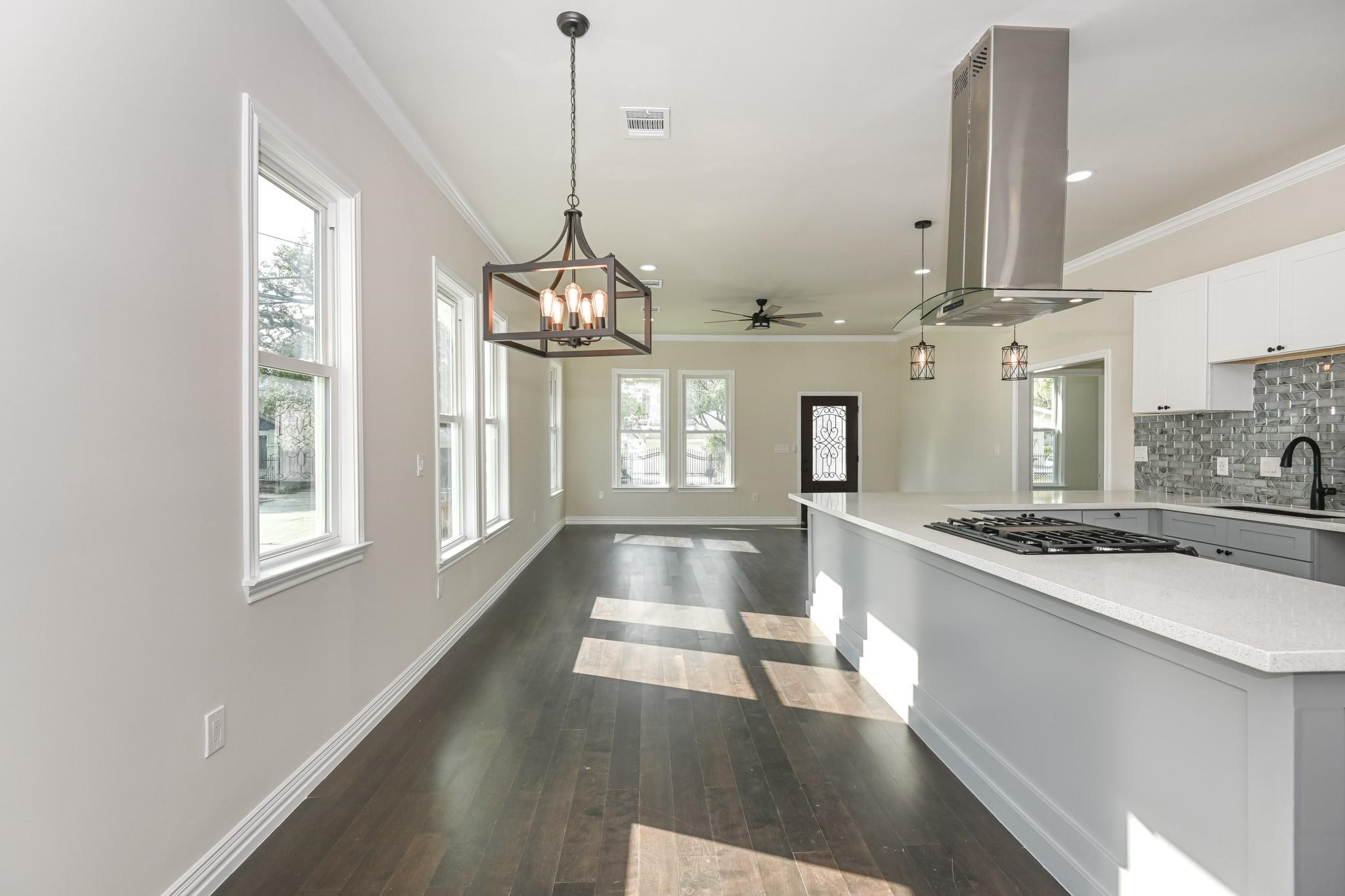 2902 Houston Avenue Houston, TX 77009 - Photo 21 of 42 a view of a kitchen with granite countertop a stove and a sink
