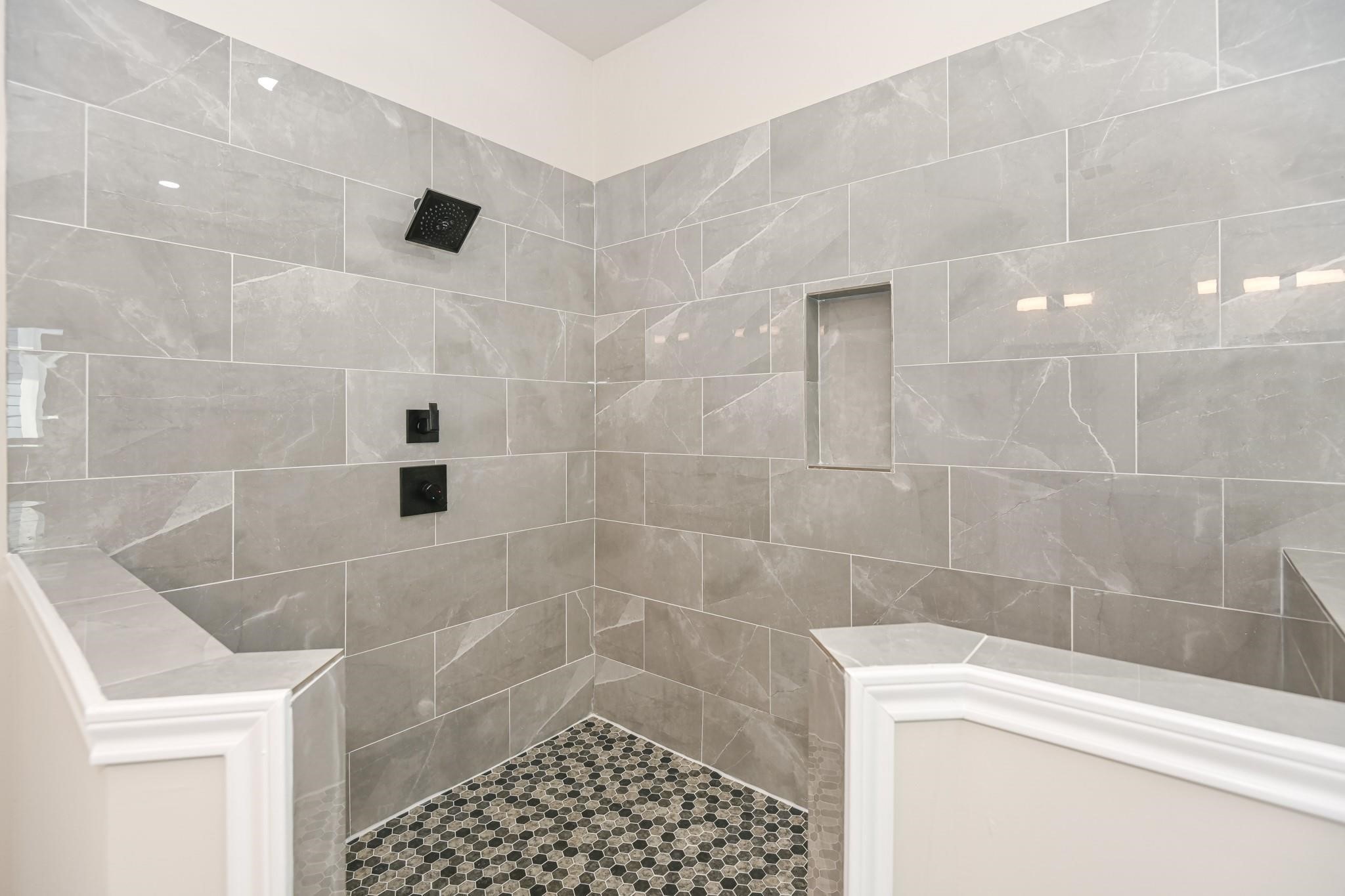2902 Houston Avenue Houston, TX 77009 - Photo 30 of 42 a bathroom with a shower and a toilet