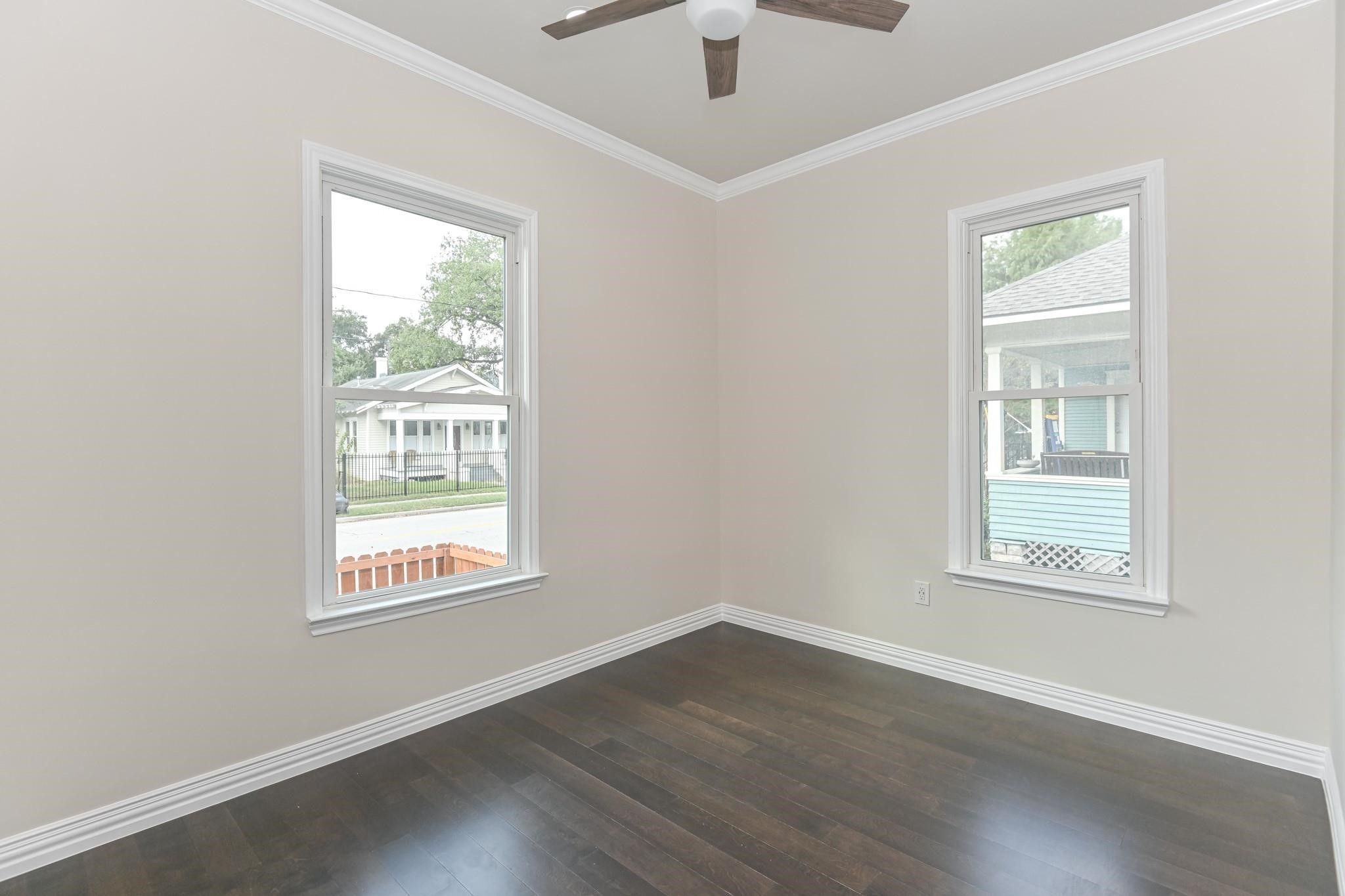 2902 Houston Avenue Houston, TX 77009 - Photo 37 of 42 an empty room with wooden floor and windows