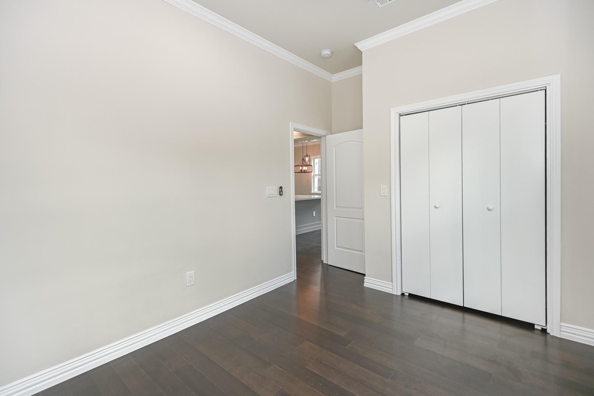 2902 Houston Avenue Houston, TX 77009 - Photo 38 of 42 a view of an empty room with wooden floor