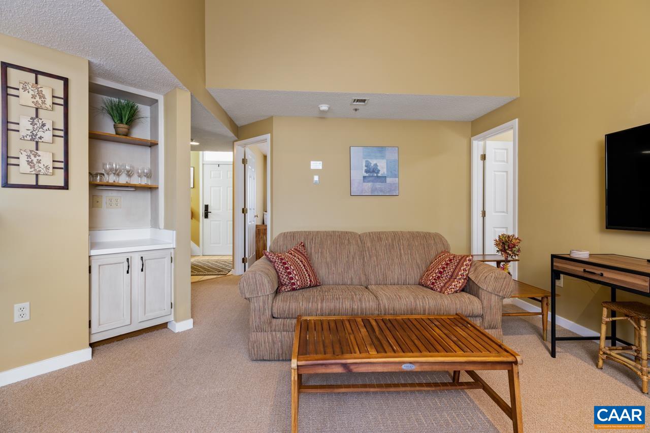 2002 Stone Rdg Wds Roseland, VA 22967 - Photo 7 of 29 a living room with furniture and a flat screen tv