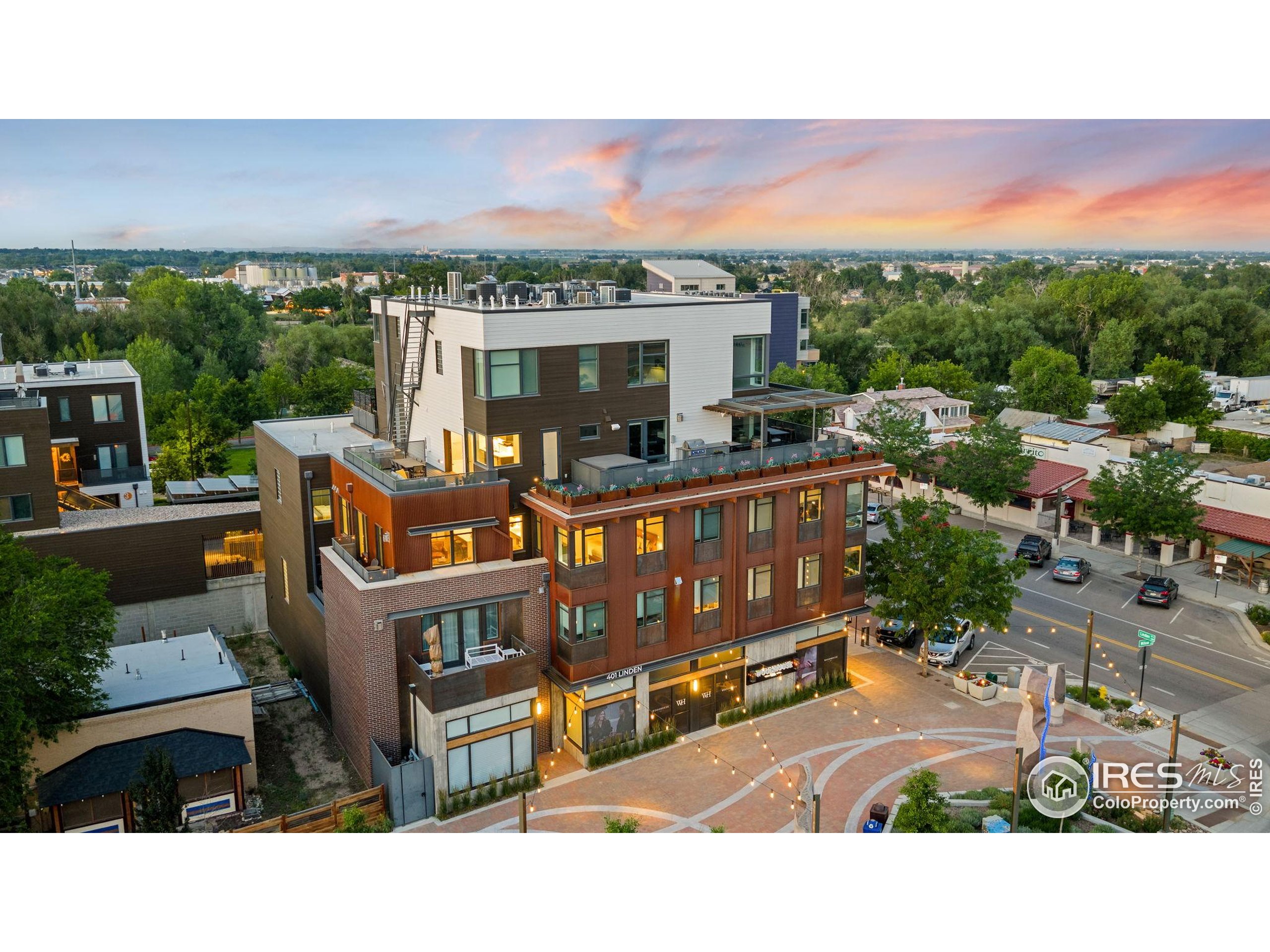 401 Linden Street, Unit 307 Fort Collins, CO 80524 - Photo 1 of 47 a view of a chairs and table in the terrace