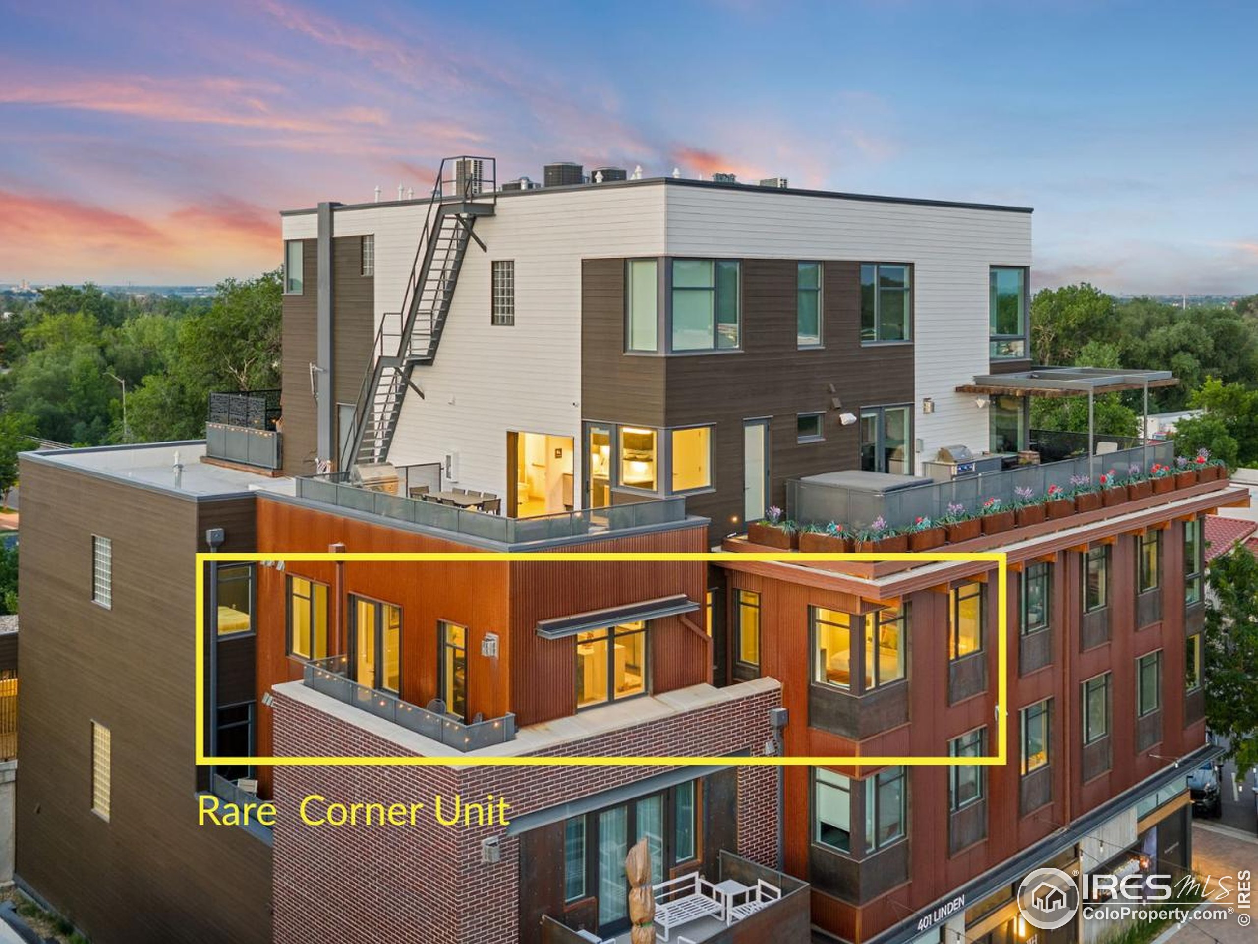 401 Linden Street, Unit 307 Fort Collins, CO 80524 - Photo 2 of 47 a front view of a building with blue walls