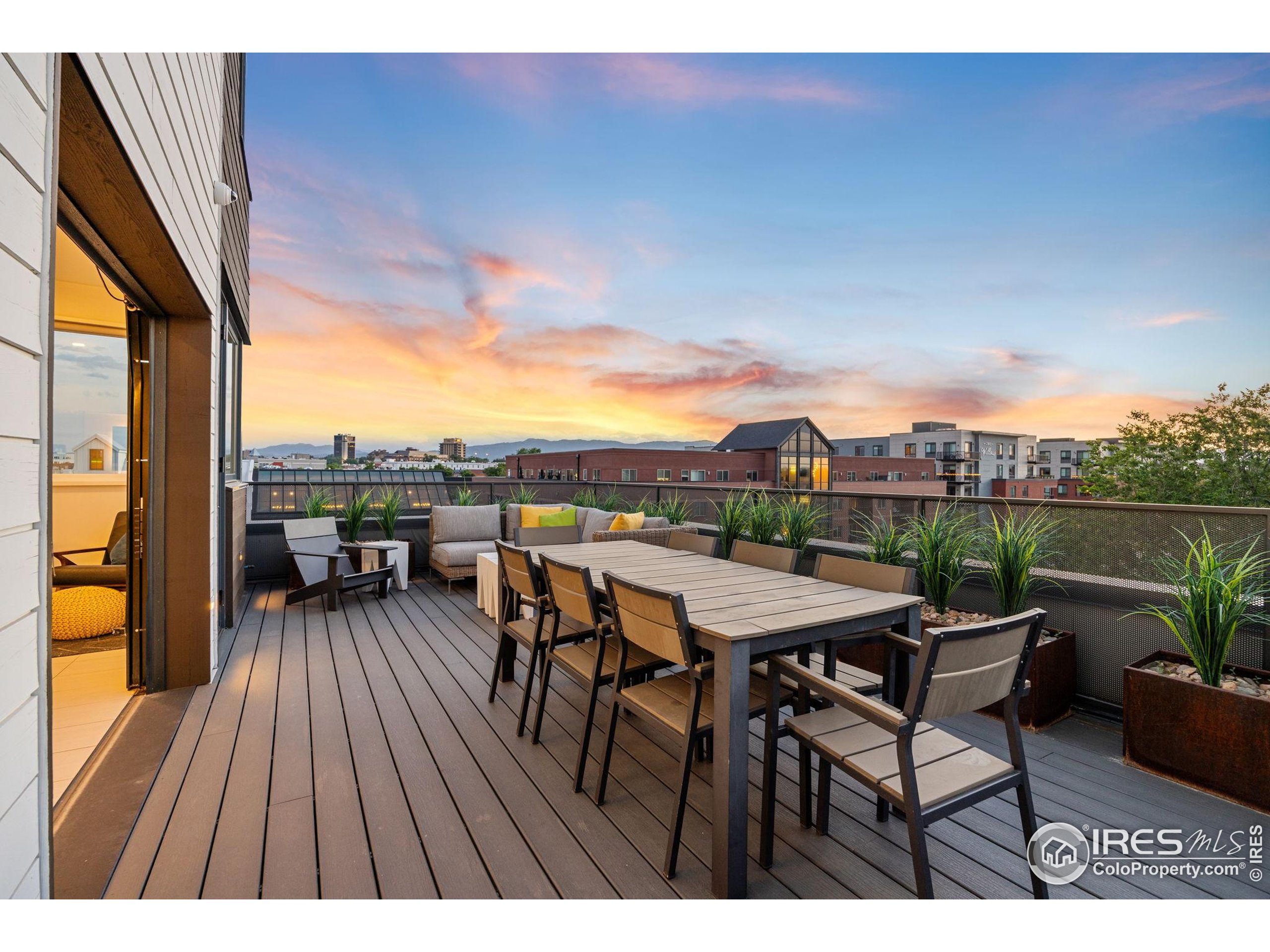 401 Linden Street, Unit 307 Fort Collins, CO 80524 - Photo 31 of 47 a terrace with outdoor seating and city view