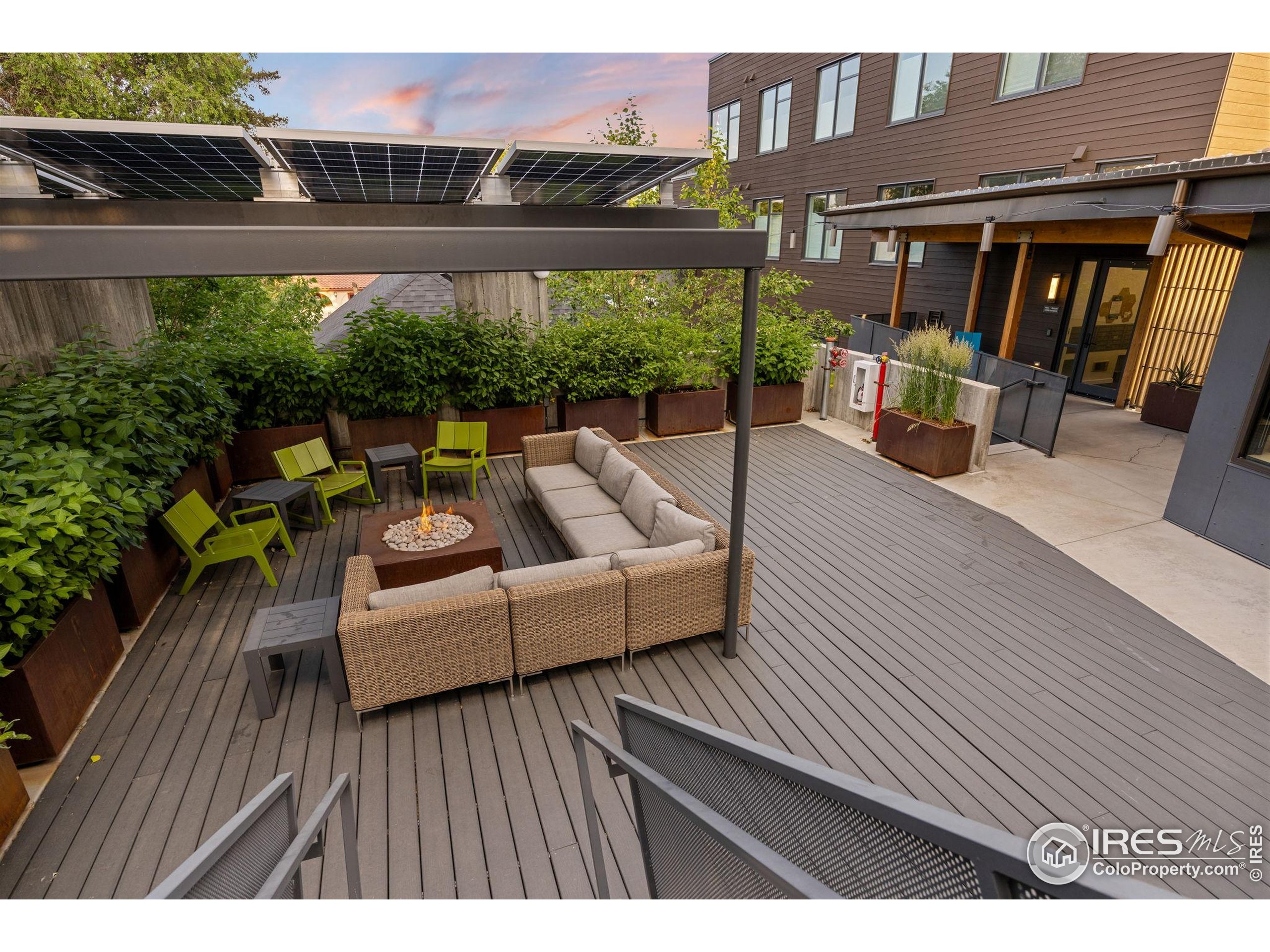 401 Linden Street, Unit 307 Fort Collins, CO 80524 - Photo 34 of 47 a view of a patio with couches and potted plants
