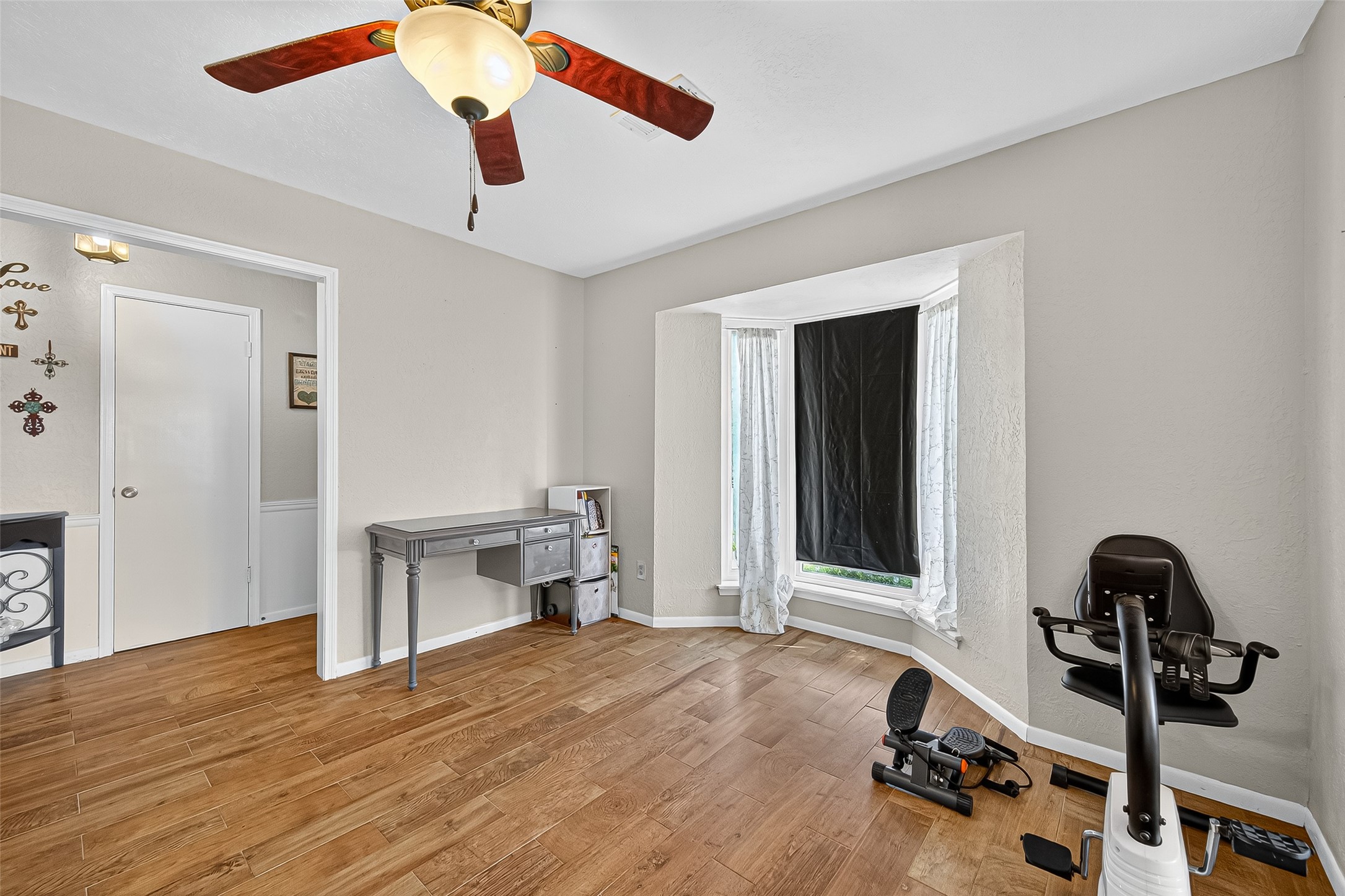14415 Wadebridge Way Houston, TX 77015 - Photo 12 of 41 a view of a room with gym equipment