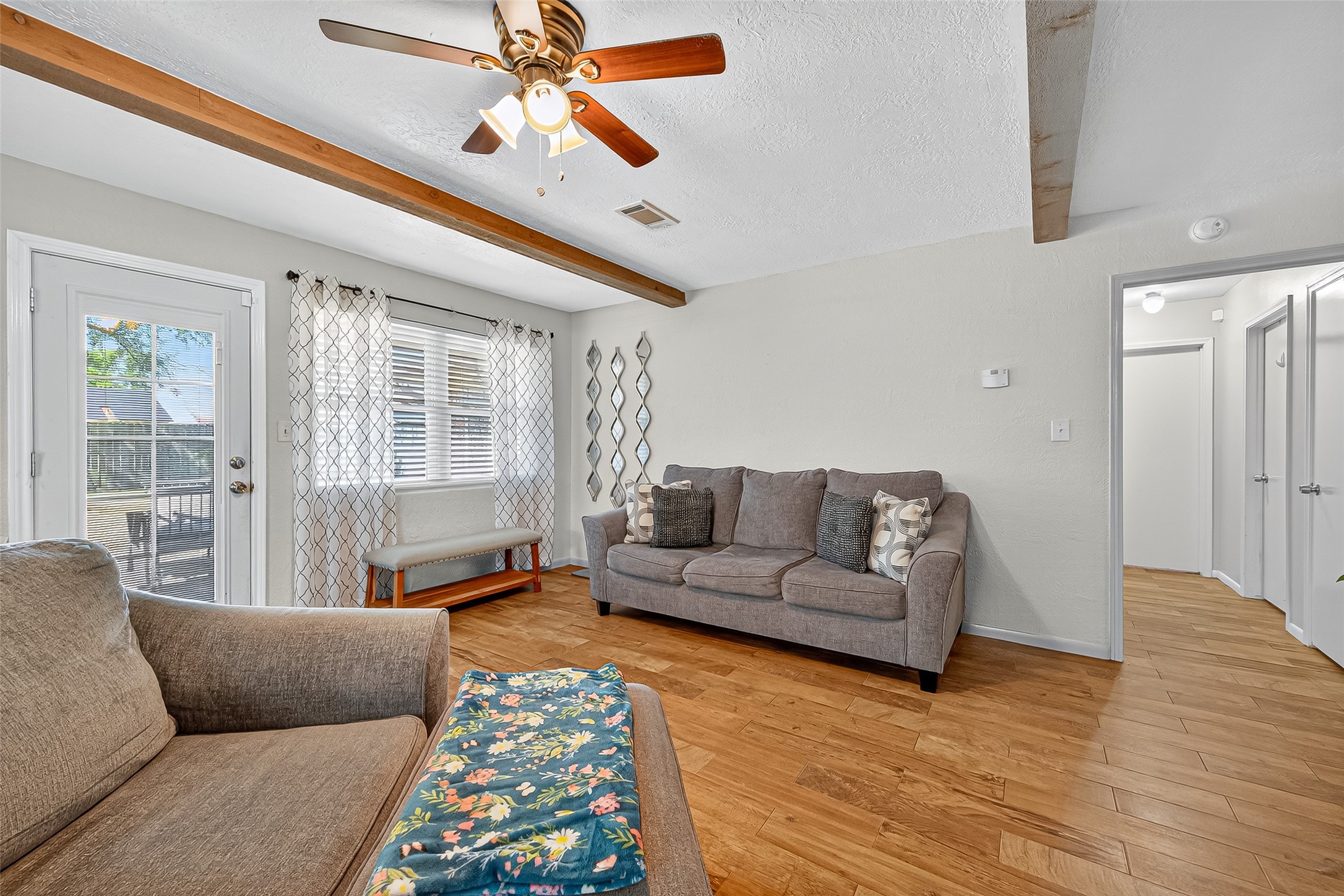 14415 Wadebridge Way Houston, TX 77015 - Photo 16 of 41 a living room with furniture and a wooden floor