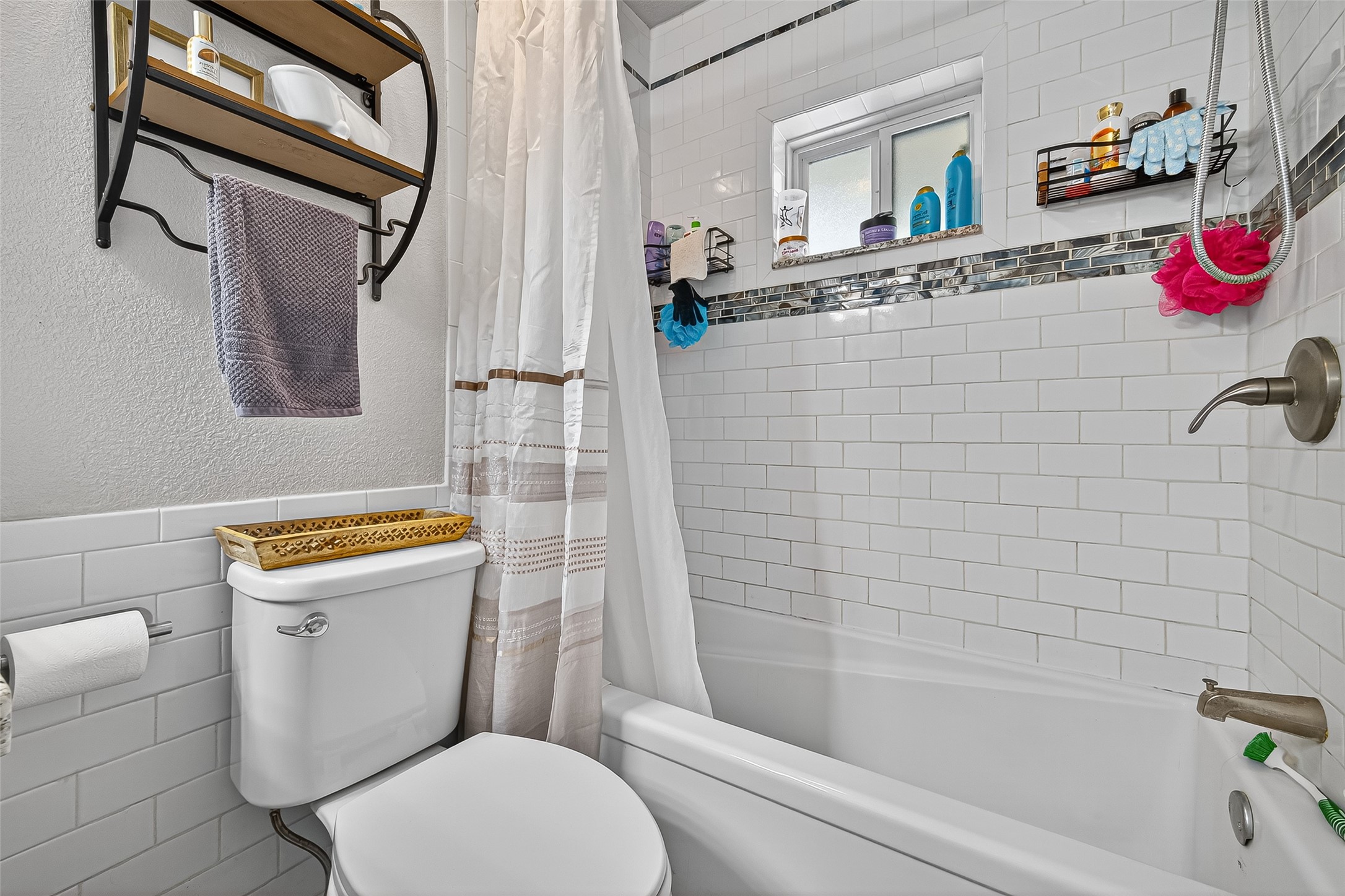 14415 Wadebridge Way Houston, TX 77015 - Photo 34 of 41 a bathroom with a bath tub sink mirror vanity and toilet