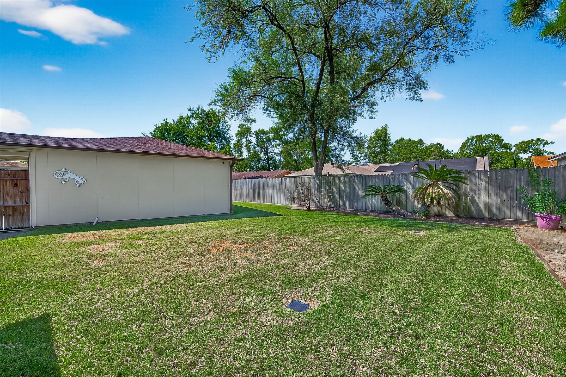 14415 Wadebridge Way Houston, TX 77015 - Photo 38 of 41 a backyard of a house with lots of green space