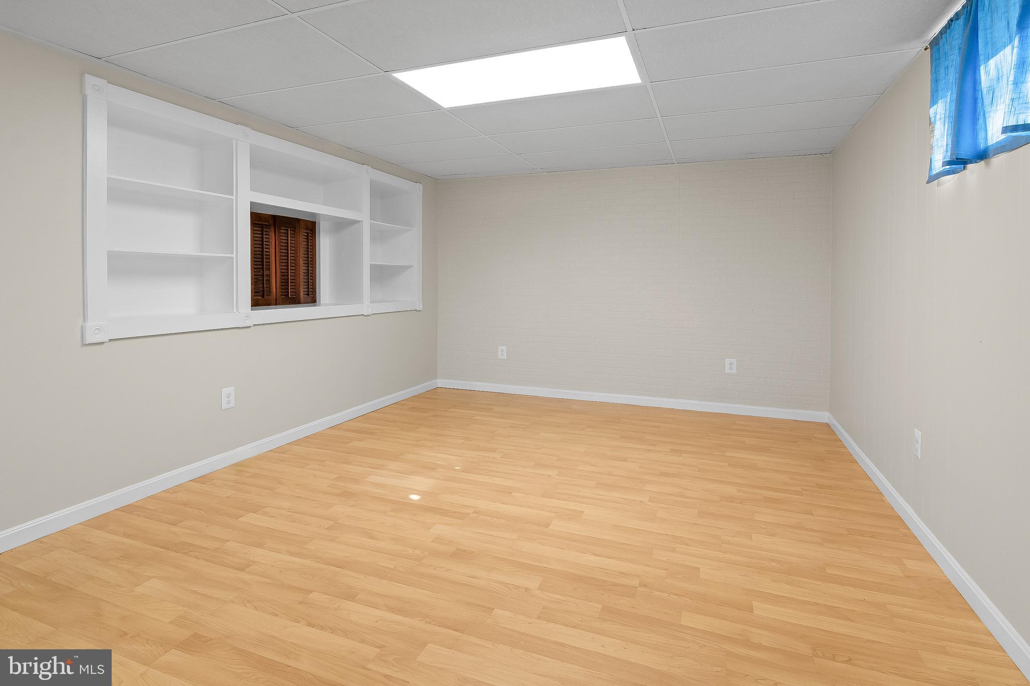 13 Moray Court Baltimore, MD 21236 - Photo 30 of 55 a view of empty room with wooden floor