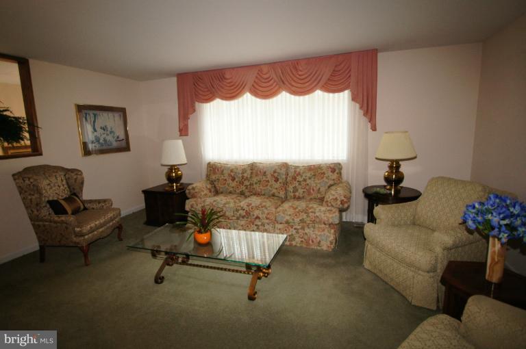 9504 Dundawan Road Nottingham, MD 21236 - Photo 11 of 30 a living room with furniture and a window