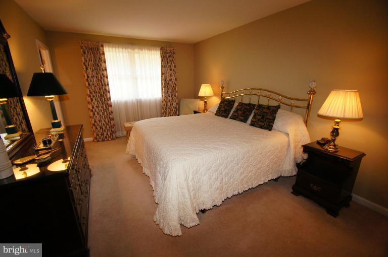 9504 Dundawan Road Nottingham, MD 21236 - Photo 15 of 30 a bedroom with a bed and window