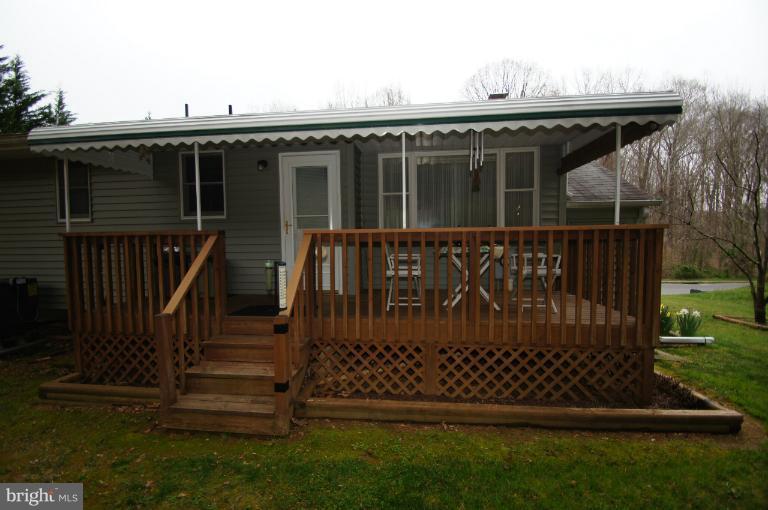 9504 Dundawan Road Nottingham, MD 21236 - Photo 25 of 30 a view of a roof deck with wooden floor and fence