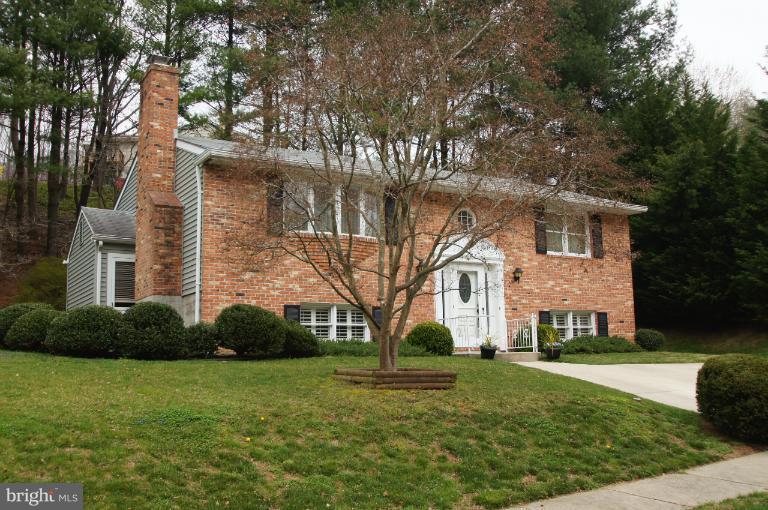 9504 Dundawan Road Nottingham, MD 21236 - Photo 27 of 30 a front view of a house with a garden