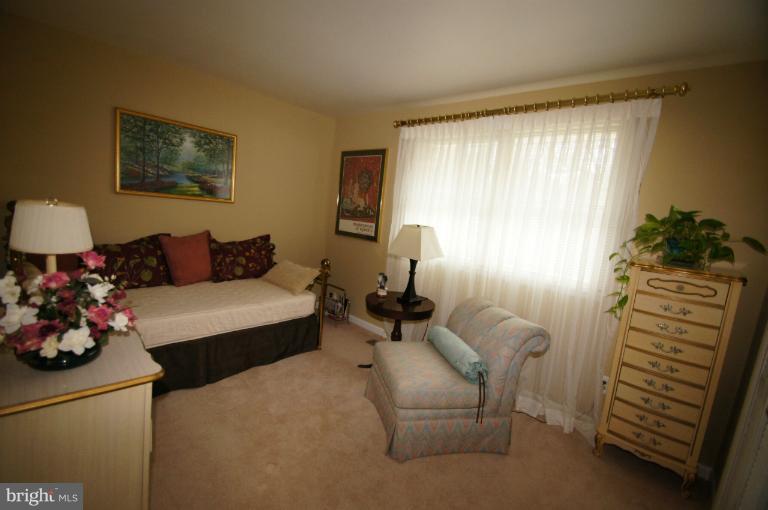 9504 Dundawan Road Nottingham, MD 21236 - Photo 9 of 30 a bedroom with furniture and a window