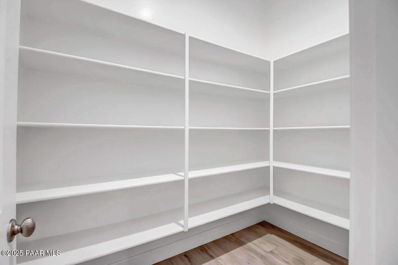 5229 Iron Vine Trail Prescott, AZ 86301 - Photo 16 of 92 a view of walk in closet with empty racks