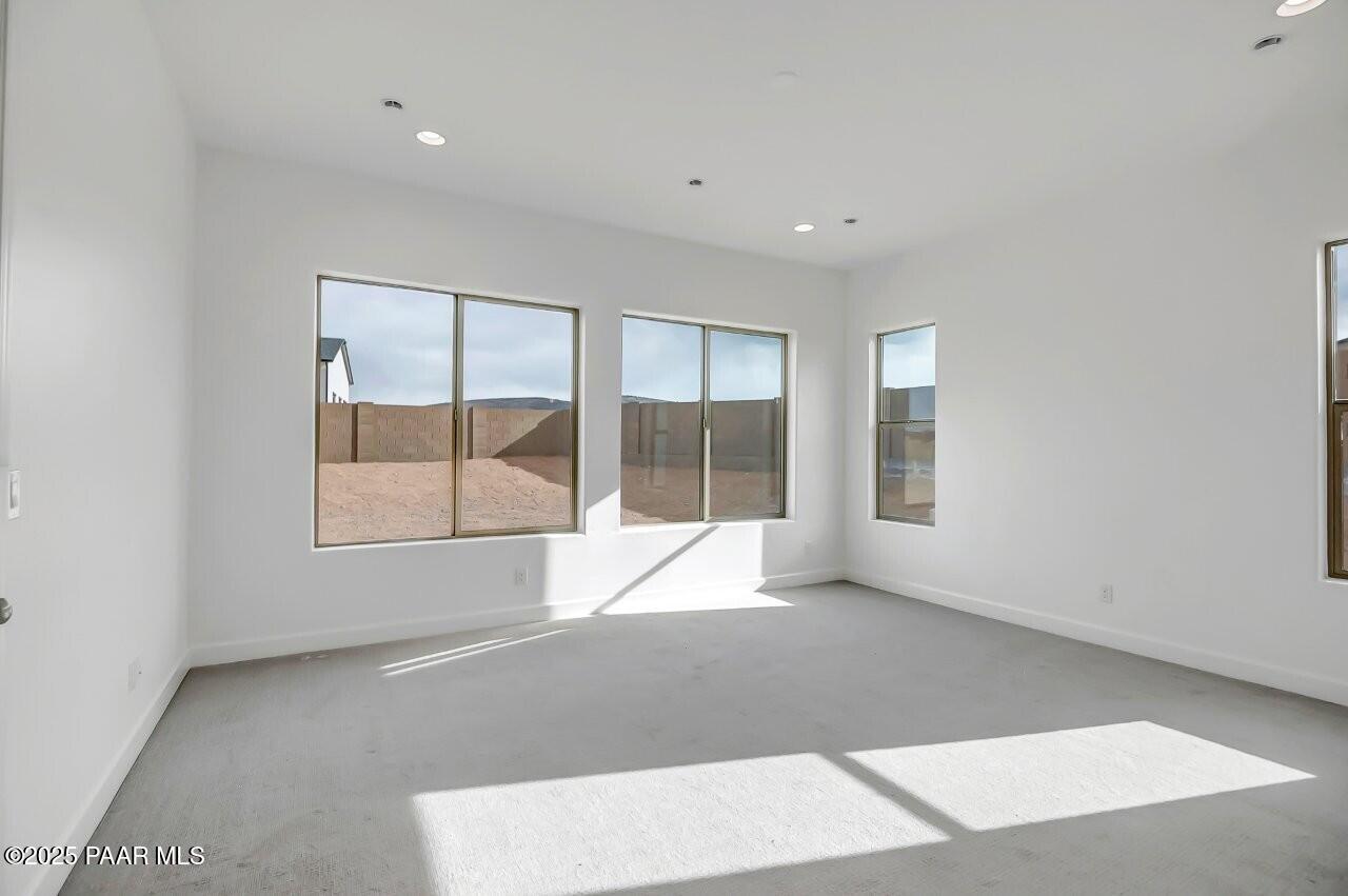 5229 Iron Vine Trail Prescott, AZ 86301 - Photo 30 of 92 an empty room with windows and closet