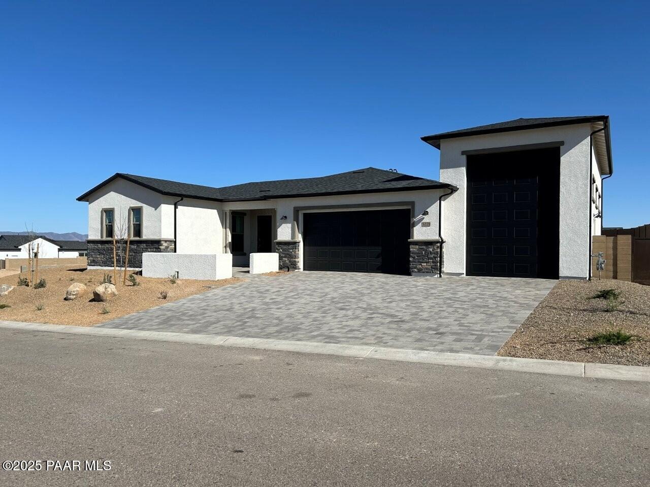 5229 Iron Vine Trail Prescott, AZ 86301 - Photo 3 of 92 a front view of a house with a entertaining space