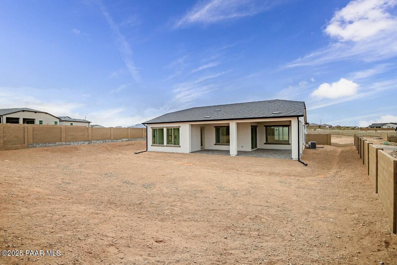 5229 Iron Vine Trail Prescott, AZ 86301 - Photo 46 of 92 a house with yard in front of it