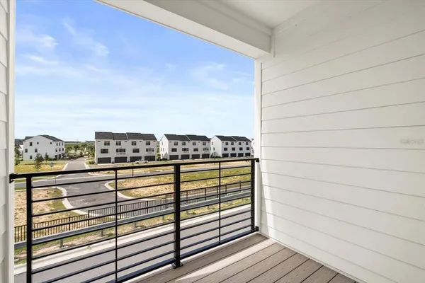 a view of a balcony with an ocean view