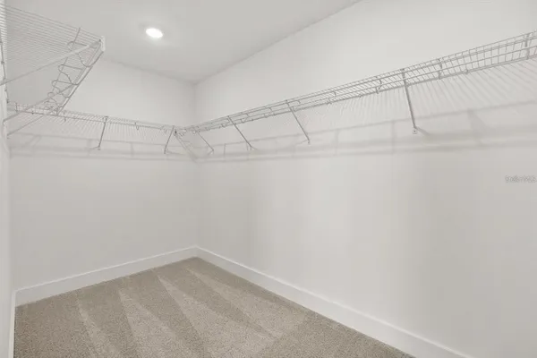 a view of a room with racks on the wall