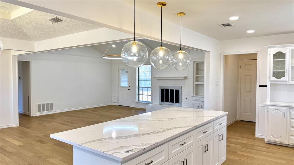 3915 Spring Hollow Drive Carrollton, TX 75007 - Photo 12 of 28 a view of kitchen and sink