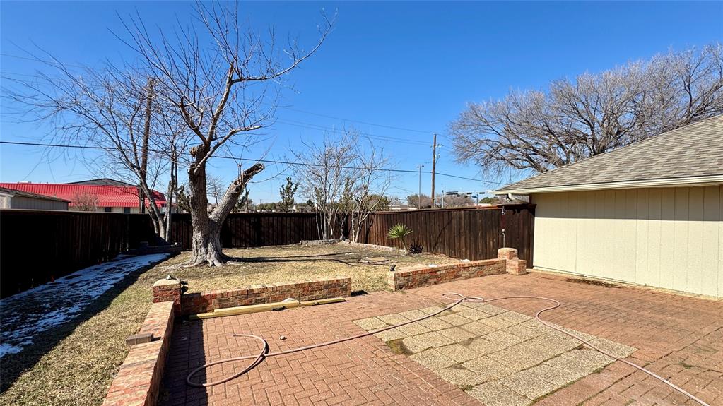 3915 Spring Hollow Drive Carrollton, TX 75007 - Photo 28 of 28 a view of a backyard of the house