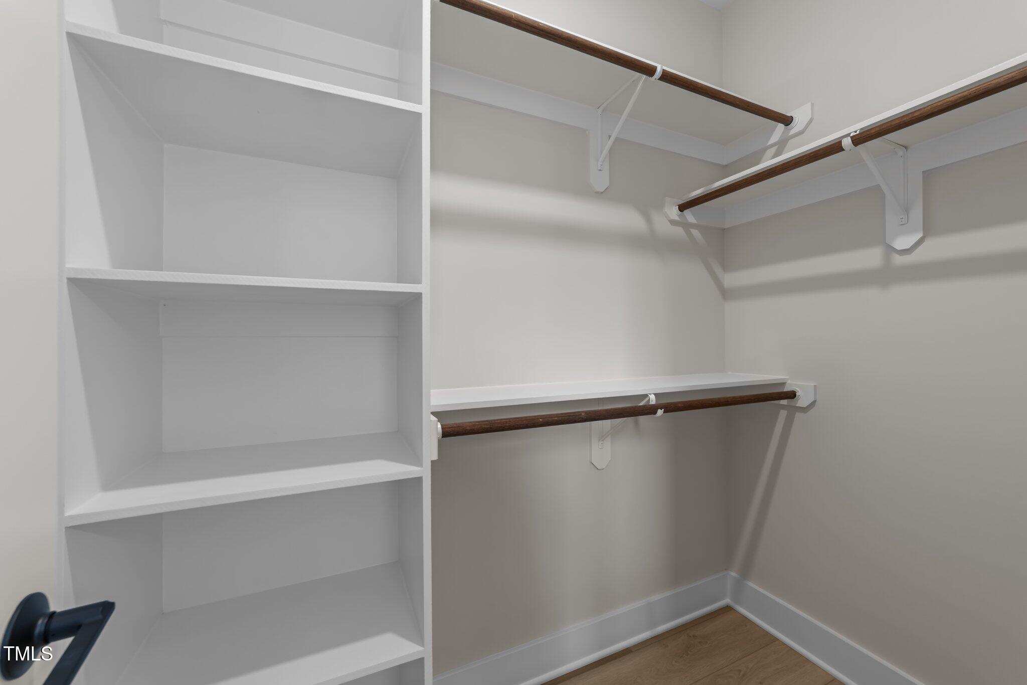 710 West North Street, Unit 101 Raleigh, NC 27603 - Photo 22 of 28 a view of an empty walk in closet
