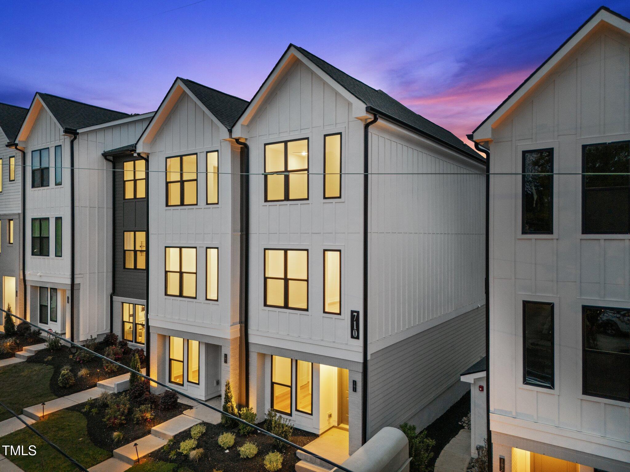 710 West North Street, Unit 101 Raleigh, NC 27603 - Photo 28 of 28 a front view of a house with balcony