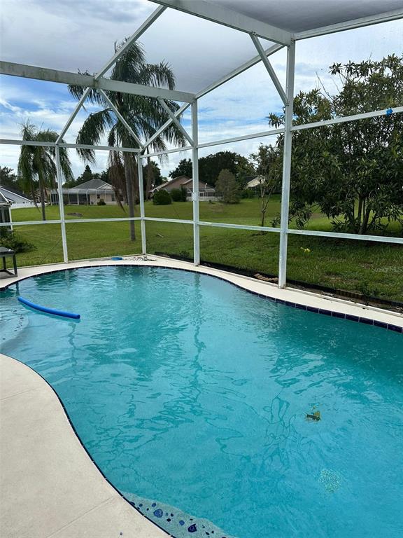 242 Durango Loop Street Davenport, FL 33897 - Photo 30 of 30 a view of a living room
