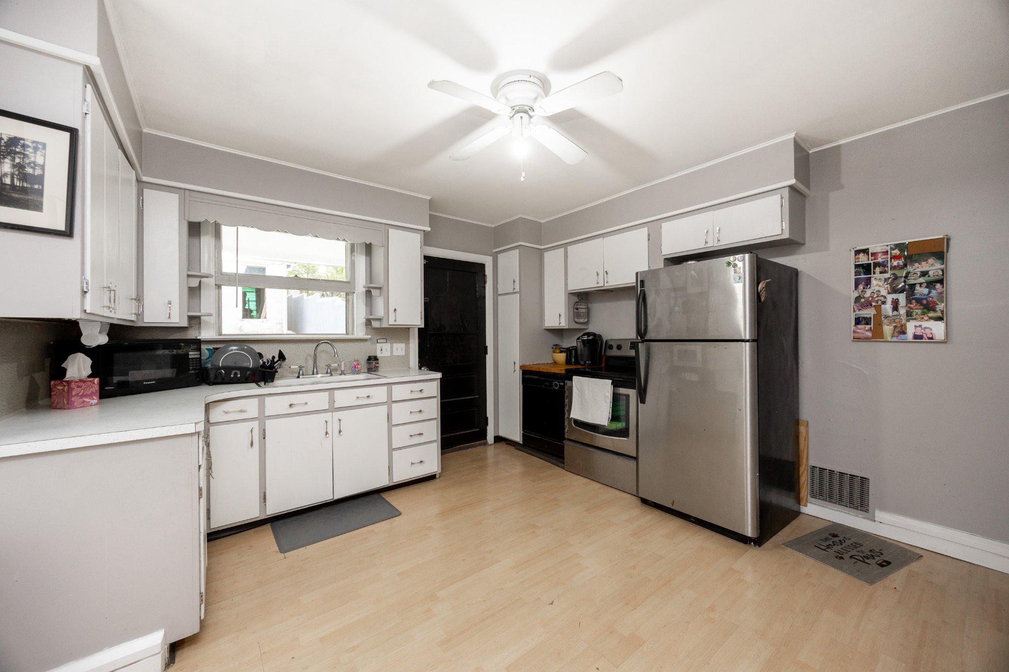 314 New Street Spring City, PA 19475 - Photo 7 of 16 a kitchen with a refrigerator and a sink
