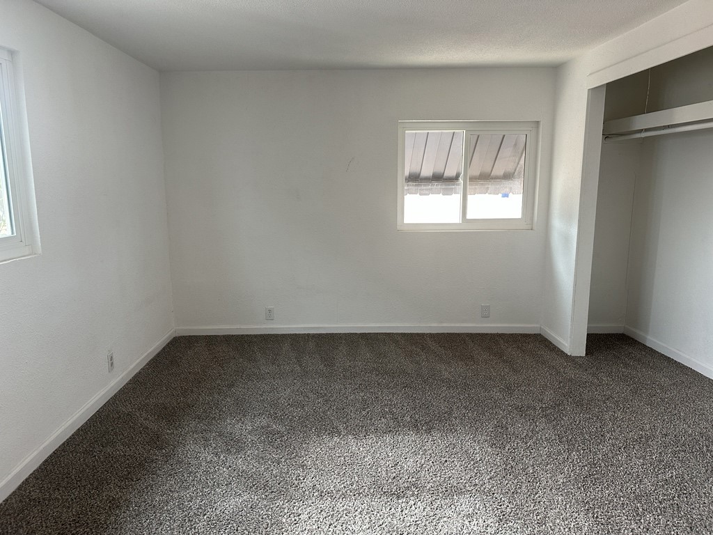 34929 Cedar Road Barstow, CA 92311 - Photo 11 of 22 an empty room with a window