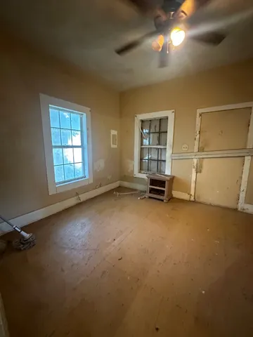 an empty room with windows